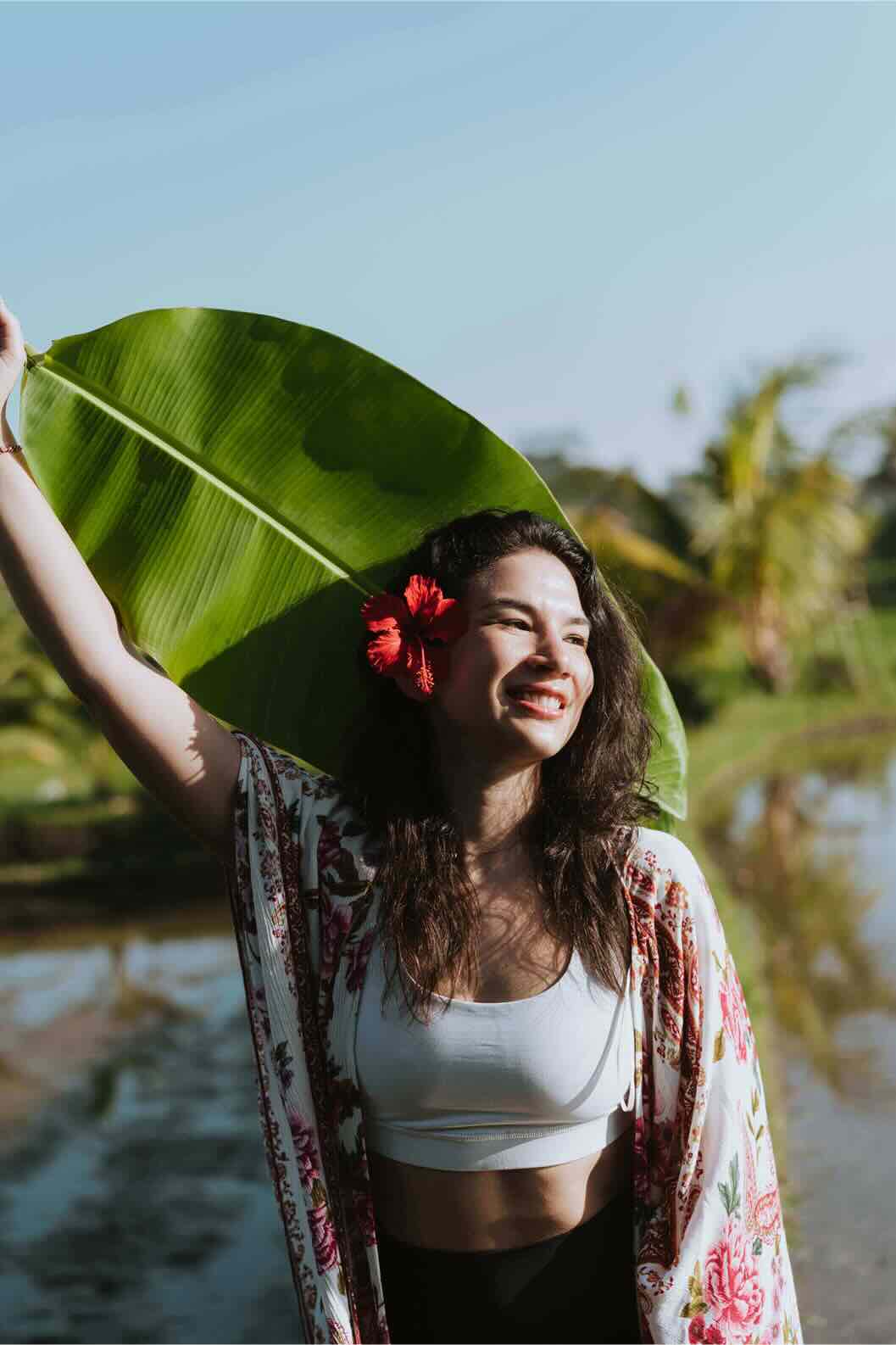 Tranformative jhourney - breathing cold bali - woman looks enlightened and is in nature