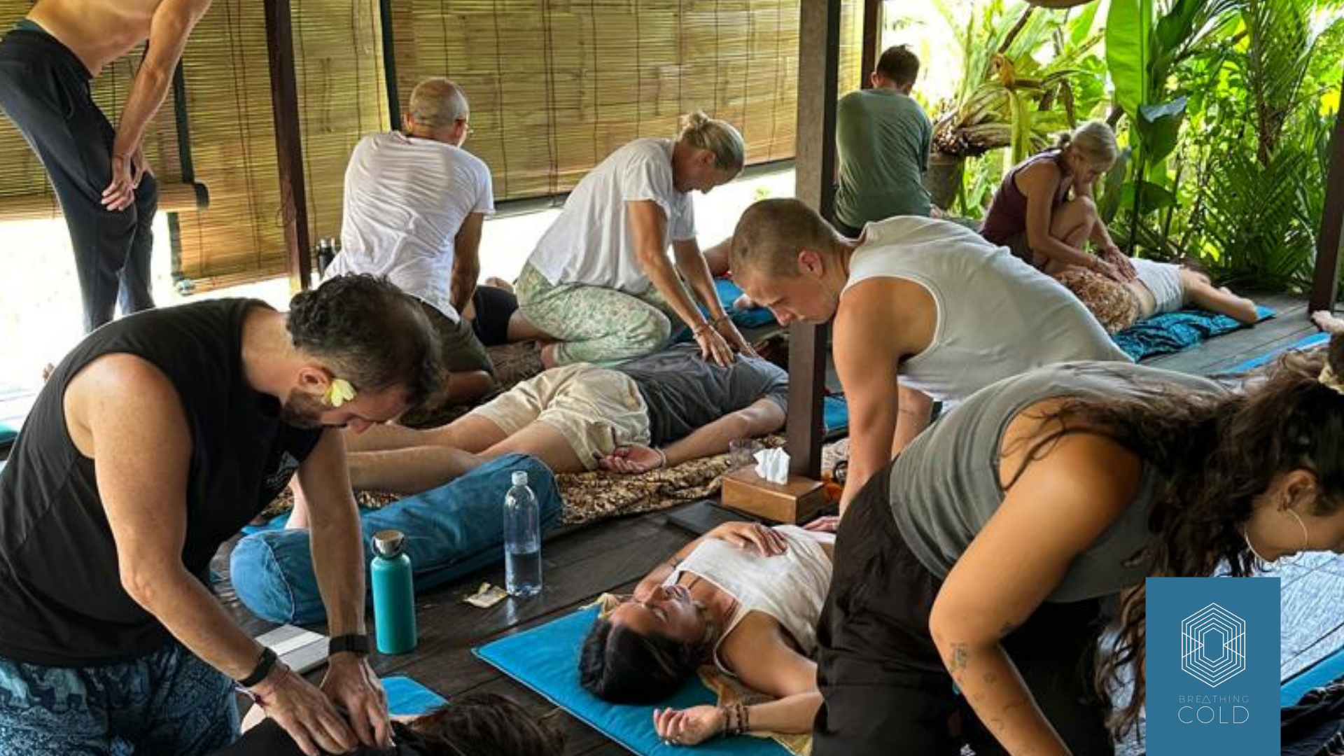 Students facilitating breathwork for participants