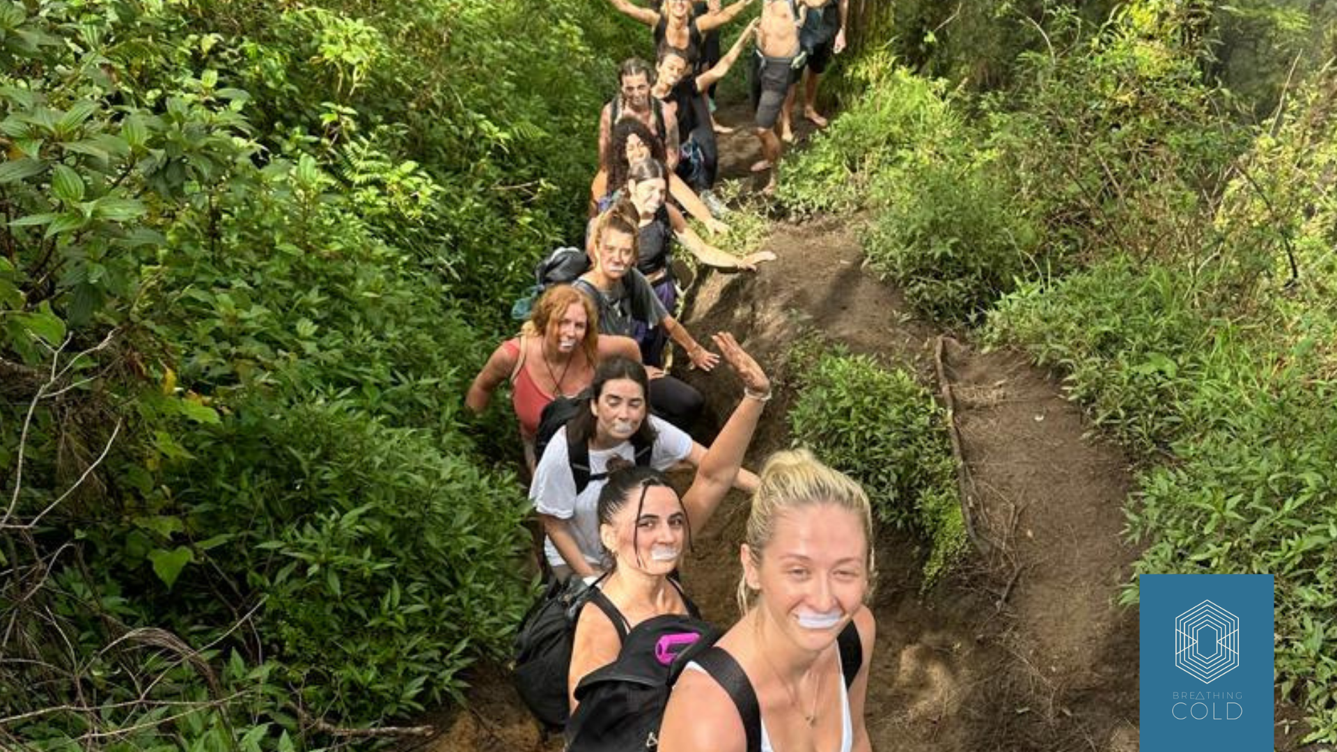 Participants climbing a mountain