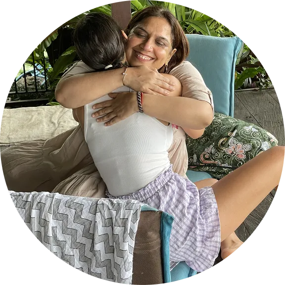 two women hugging each other during the breathwork facilitator training in India
