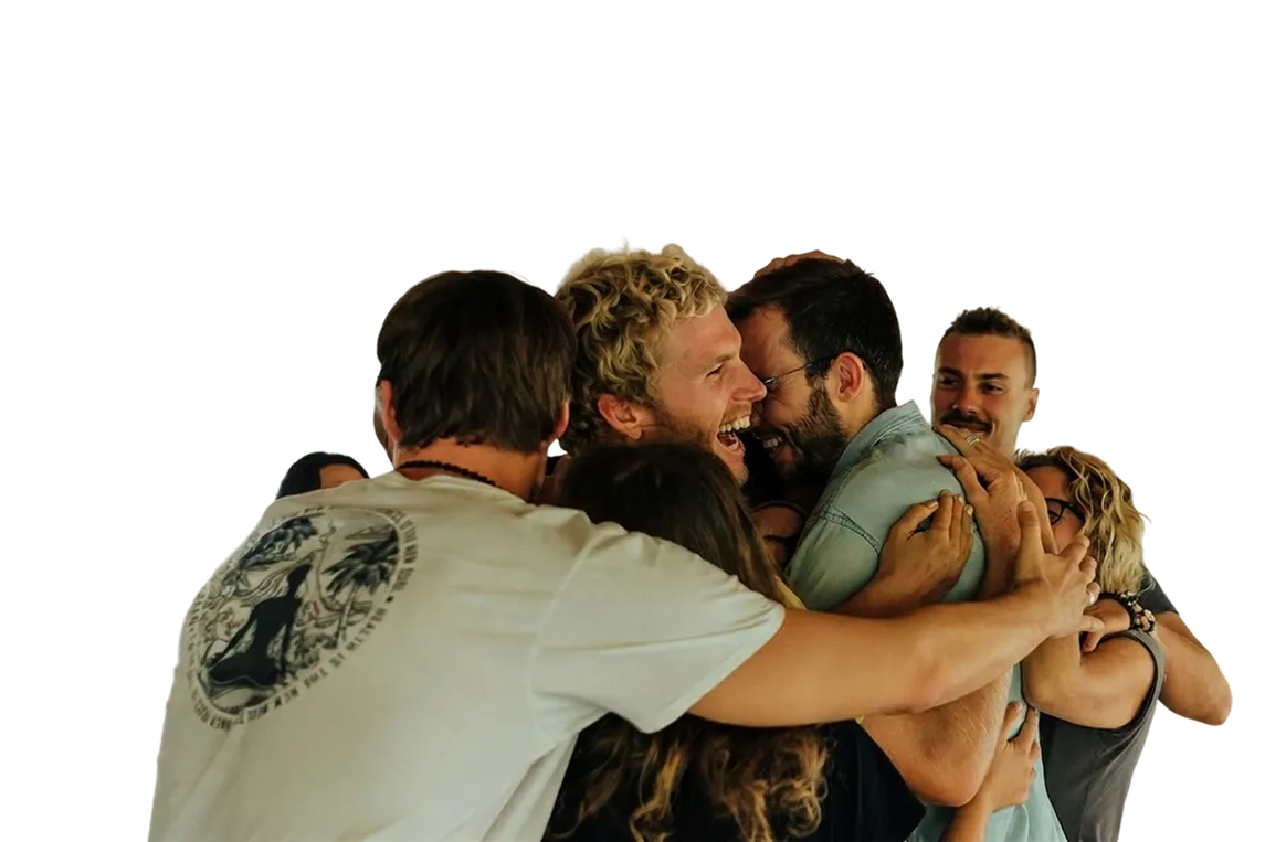 group of breathwork students hug during retreat in Ubud Bali hosted by BreathingCold