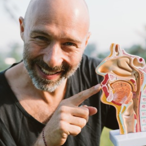 Alex pointing at a mouth